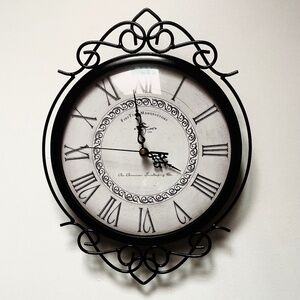 Elegant Black and White Scrollwork Wall Clock